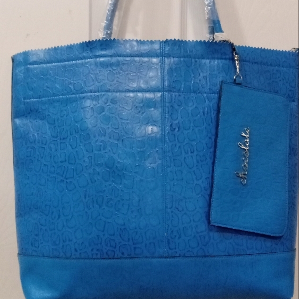 Chocolate Blue snake print NWOT Leather Tote, with Matching Pouch.